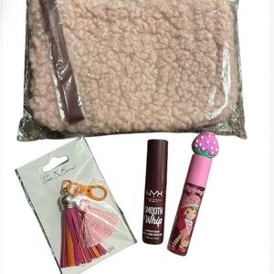 Pink Fuzzy Costmetic Bag With Lip Products and Bag Charm